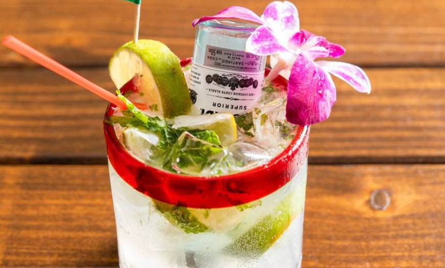 Image 4: Vibrant Rooftop Dining: Choose Meals, Margaritas, or Dining Credit