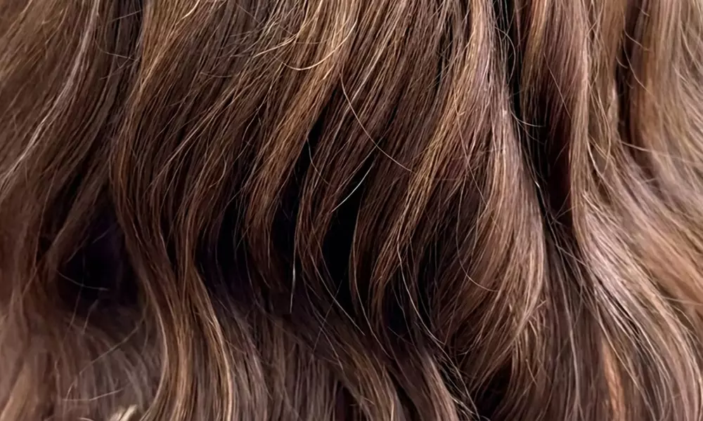 Save Up to 54% Off on Women's Blowout & Deep Conditioning with Optional Hot Tool Finish at Unreal Beauty - Primary Image