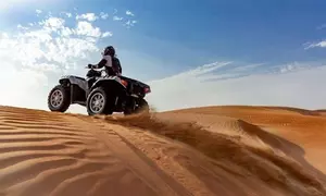 Desert Safari with Quad Biking and Home or Hotel Pick-Up for Up to Six from Iconic Tourism