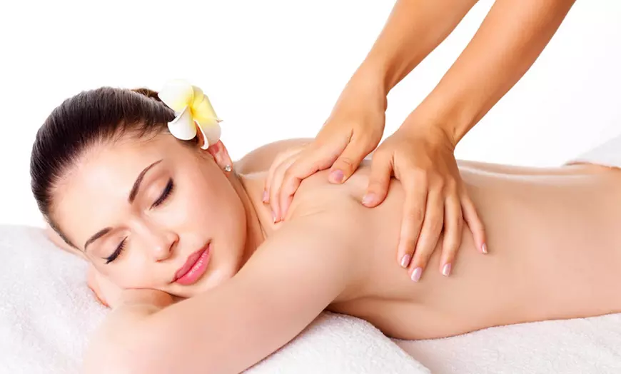 Image 2: 30, 50 or 70-Minute Hot Stone Massage with Warm Organic Oil for 1 or 2