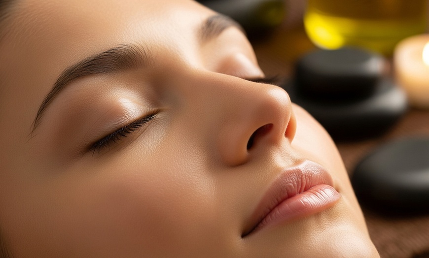 Image 3: 30, 50 or 70-Minute Hot Stone Massage with Warm Organic Oil for 1 or 2