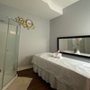 Image 3: 45 or 60-Min Couples Foot or Body Massage