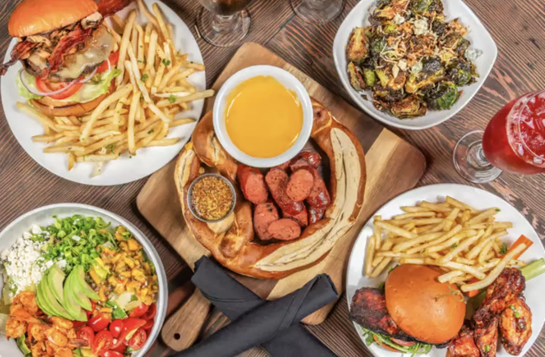 Indulge in Hood Burgers and Beers, $30 or $50 Dining Credit Two or Four with Up to 33% Off - Primary Image