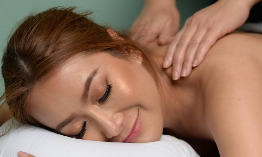 60 Min Swedish, Hot Stone, or Deep Tissue Massage for One or Couples