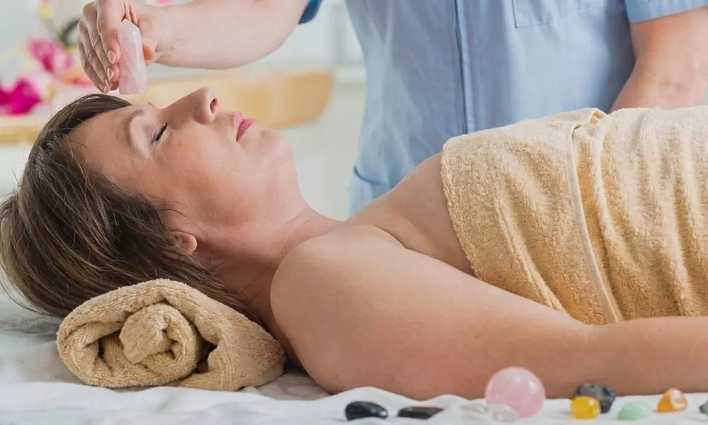 Ashley Loebs: LMT Full Body Massage with Facial Therapy 60 or 90 Minute for Renewal Ritual (Up to 37% Off) - Primary Image