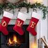 Image 1: Red Flannel Christmas Stocking with Letter Design