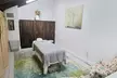 60-Minute Swedish/Deep Tissue Massage or Deep Cleaning Facial & More at Heavenly Hands 4 U (Up to 33% Off) - Second Medium