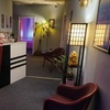 Image 1: 60-Minute Couples Massage with Hot Stones: Reconnect & Unwind Together