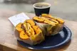 Enjoy $15 or $25 Voucher towards Food & Drink on Tasty Bagels with(Up to 42% Off) - Queens Bagels & Delicatessen - Second Medium