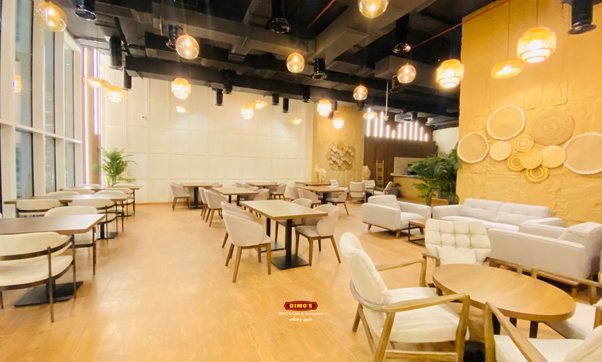 Image 9: Savor Any 1, 2, or 4 Pizzas with 1, 2, or 4 Soft Drink in Business Bay