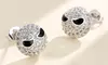 Night Before Christmas Earrings with crystals  in White Gold