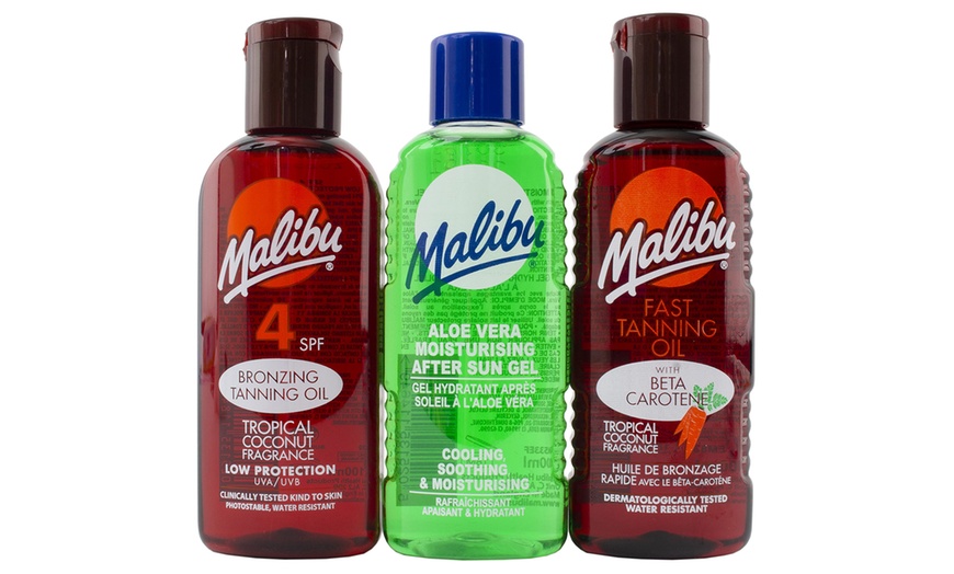 Image 1: Three-Pack Malibu Tanning Oil; SPF 4, After Sun and Tan Enhancer
