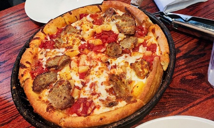 Individual Specialty Pizza or Individual Create Your Own Deep Dish Pizza with Three Toppings, and One House Beer or Wine - Uno Pizzeria & Grill Ellicott City