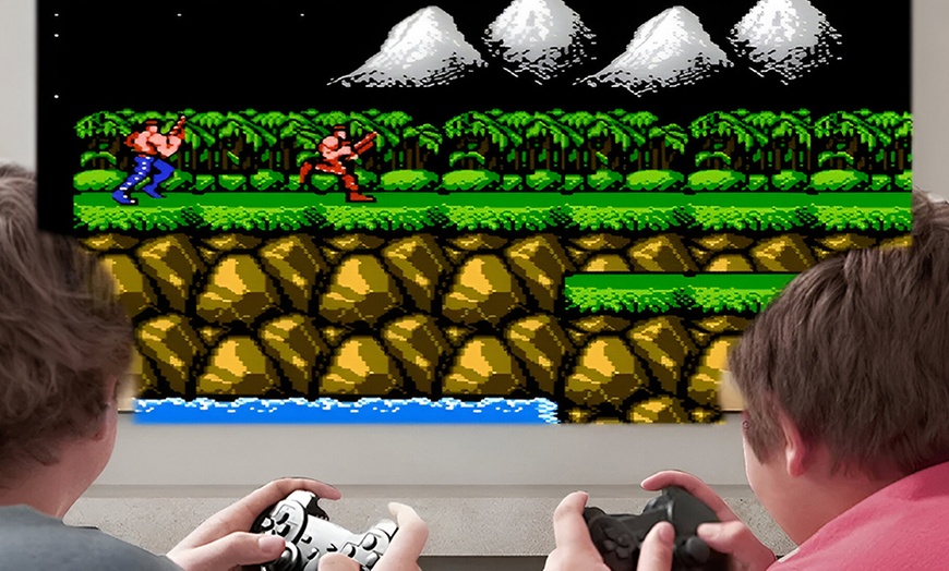 Image 5: Consola con proyector Ultra HD, mando a distancia y mandos para jugar