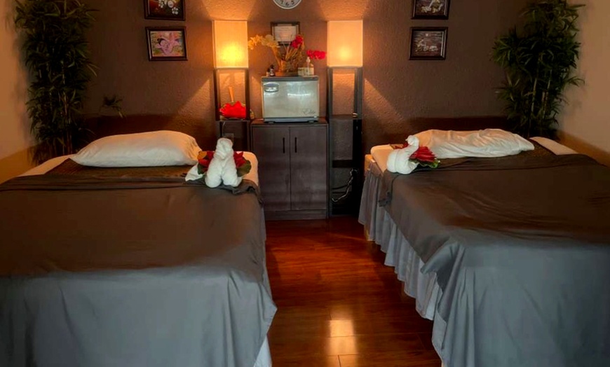 Image 3: 60 or 90-Minute Deep Tissue Massage with Hot Stones & Aromatherapy