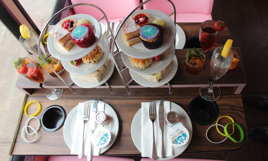 Image 5: Wimbledon Themed Afternoon Tea Bus Tour with Prosecco & Souvenir Mug!