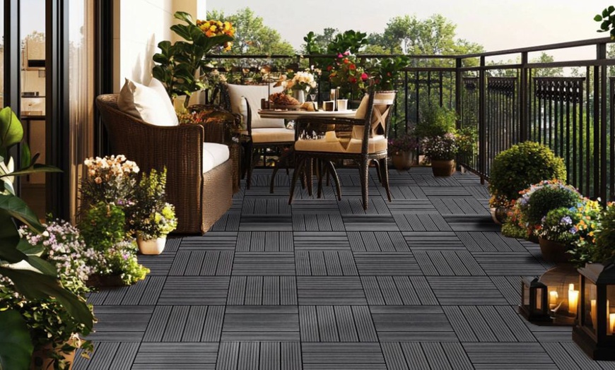 Image 1: Up to 50 Packs of Non-Slip Decking Tiles - Grey or Brown