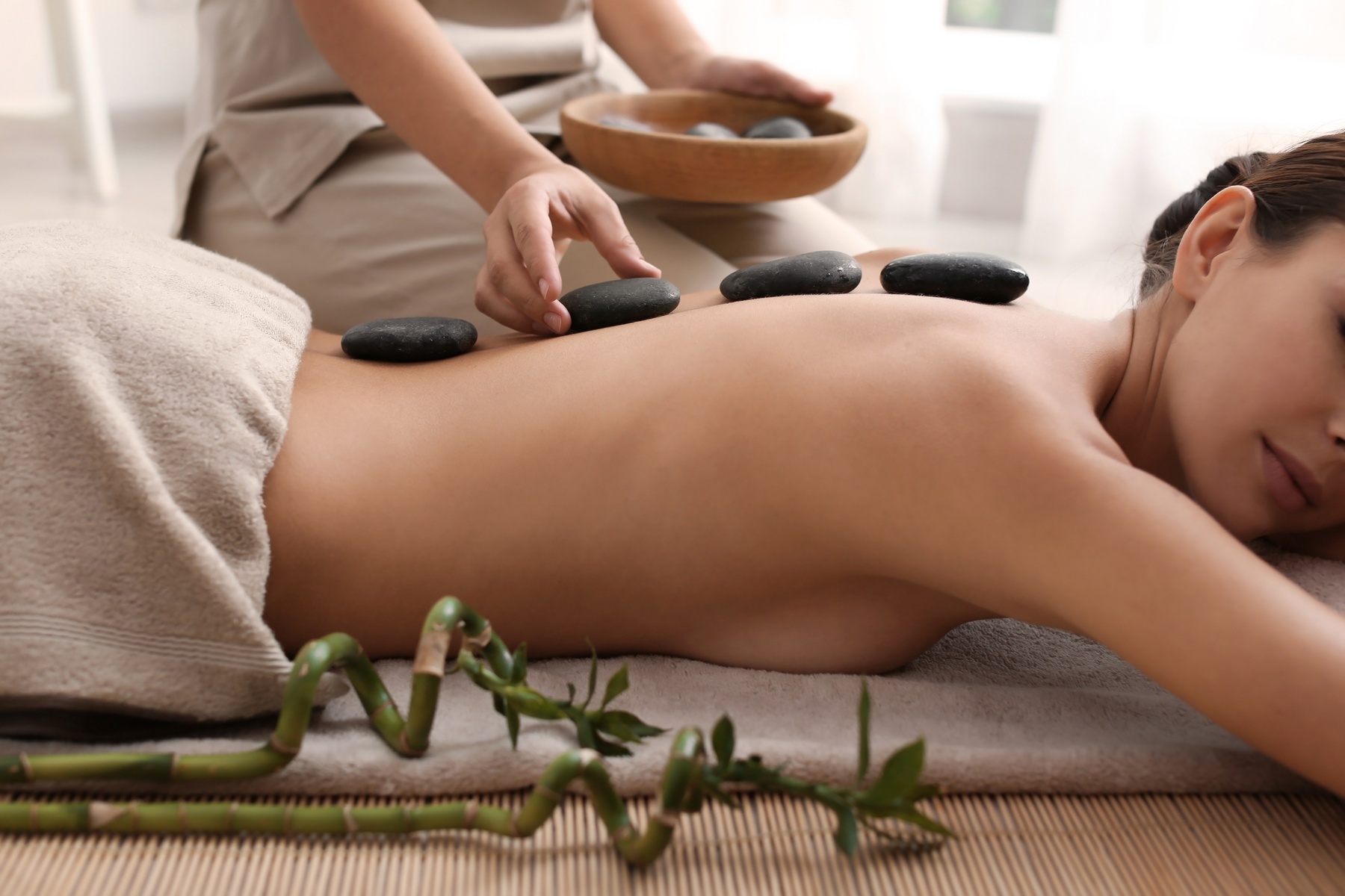 Experience soothing massages at Lavender Foot Spa Q with options including hot stones and sea salt soak, up to 50% off
