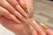 Gel Mani - Pedi or Full Set Gel Short Acrylics with Collagen Hand Treatment (Up To 44% Off) - Second Medium
