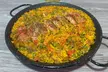 Menú mediterráneo de arroces o platos de carne/pescado para 2 o 4 con opción a botella de vino, ahorra hasta 48% - Second Medium