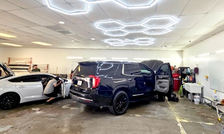 Sun-Tek Window Tint Lifetime Warranty: 2 Front Windows - Custom Car Stereo & Tint