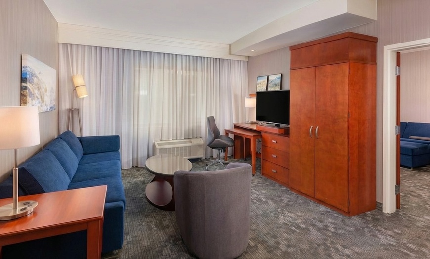 Image 7: Courtyard-Style Hotel Retreat with Outdoor Pool & Bistro Dining