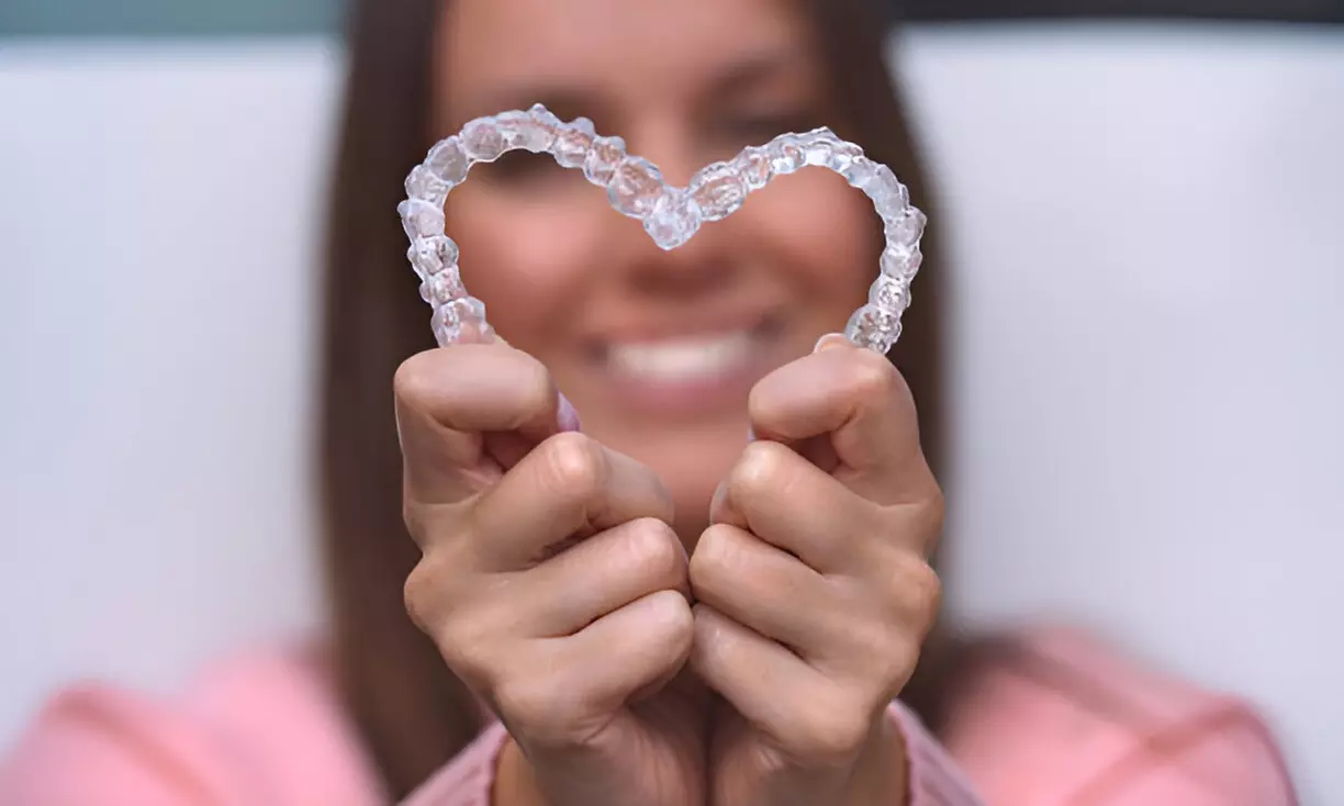 Dental Consultations: Invisalign, Implants & Exam with Cleaning
