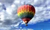 Experience a Majestic Sunrise with 4-Hour Hot Air Balloon Ride for One or Two People  (Up to 19% Off) 