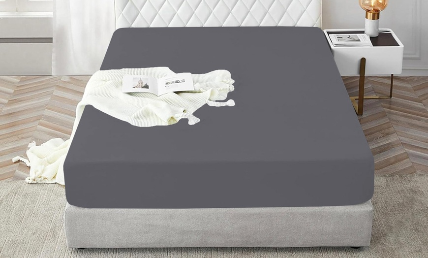 Image 13: Sábana bajera con esquinas