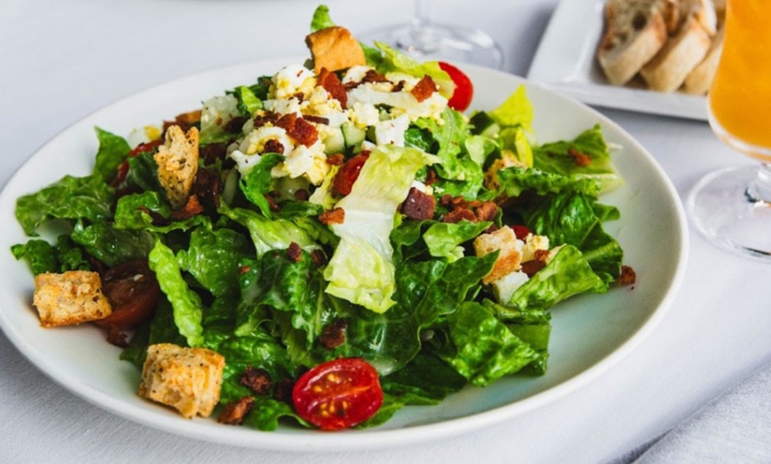 Image 9: Luxurious 4-Course Dinner for 2 or 4 with Chic Charlotte Skyline Views