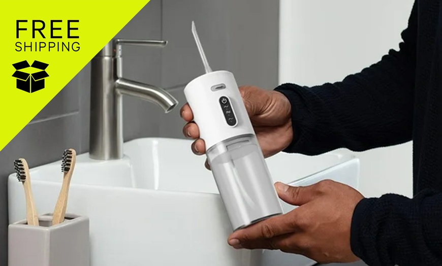Image 1: Cordless Electric Water Flosser