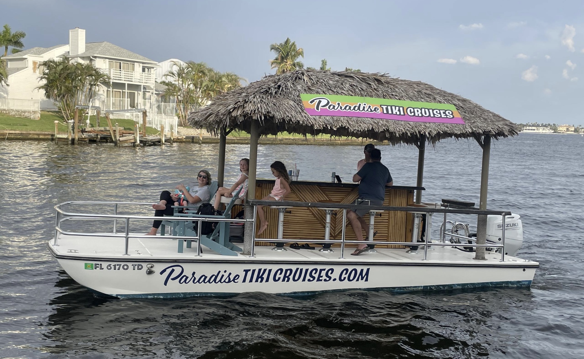 Join a 90-Minute Tiki Boat Cruise with Friends or Family