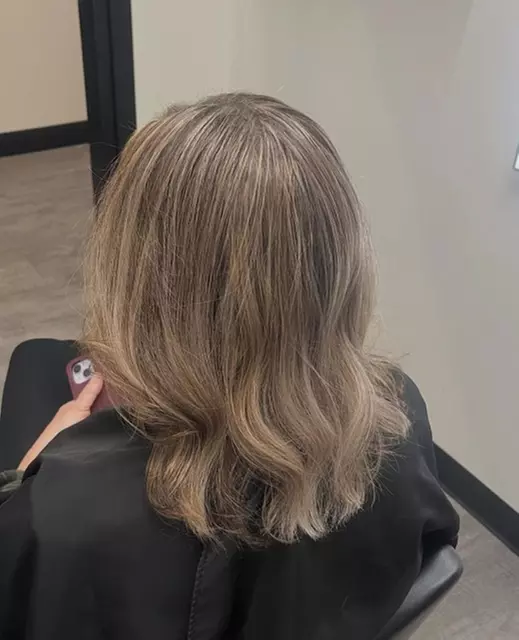Get a Haircut with Choice of Highlights and Style Options 