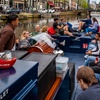 Image 6: Premium sloepvaart met onbeperkte drankjes in historisch Amsterdam