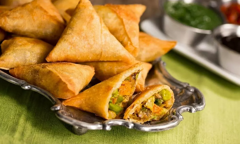 Three Course Indian Meal with Bottle of Wine for Two or Four People