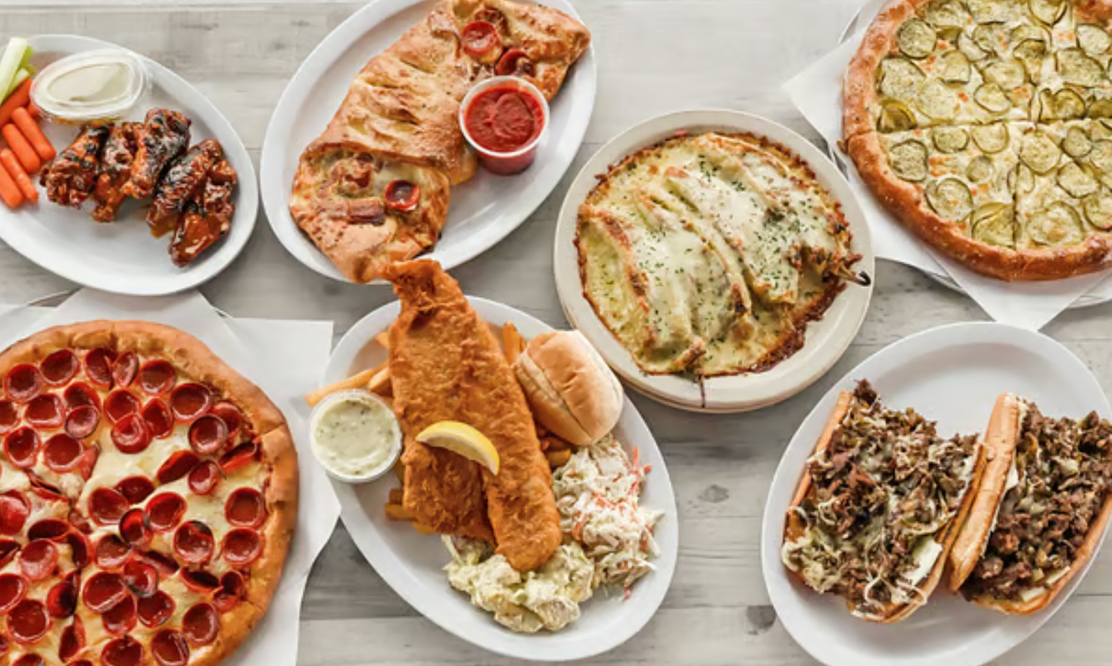 1 or 3 12'' Pizza's w/ 2 Toppings, Wings, & Beers, Wines or Cocktails