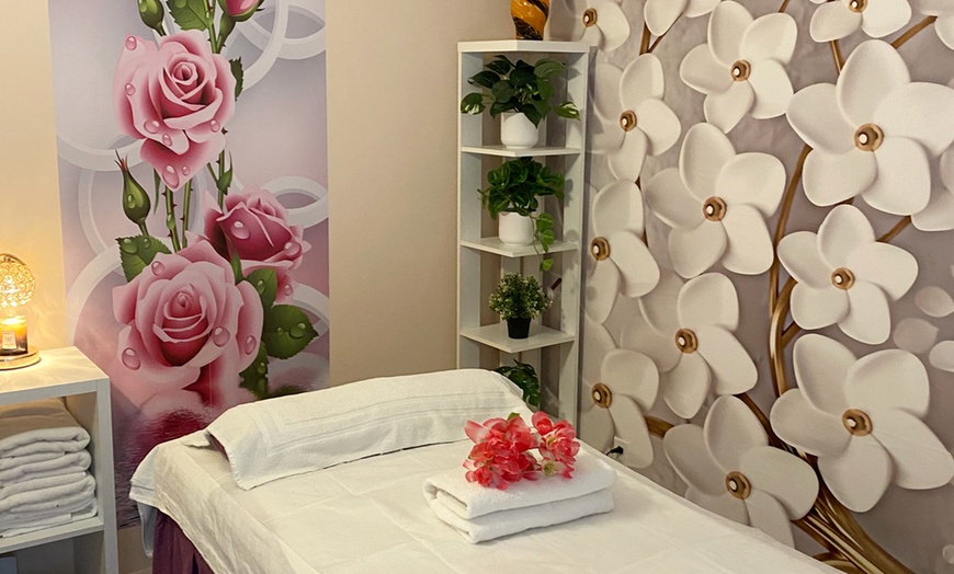 Image 1: 60 Min Deep Tissue Massage w/ Hot Stones for One and for Couples
