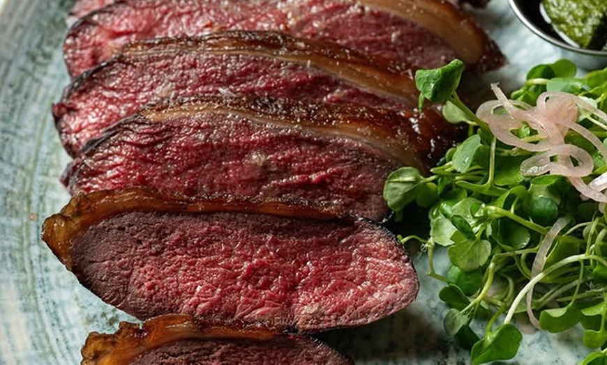 Image 9: Enjoy Dry Aged Sirloin with Sides and Wine for Two or Four Guests