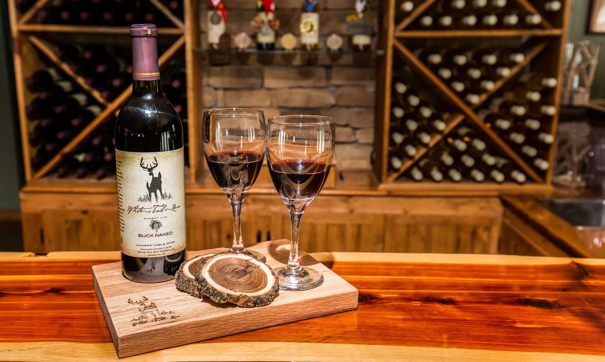 Wine Tasting for One, Two, or Four People with Take Home Wine Drizzles at White Tail Run Winery (Up to 38% Off) - Primary Image