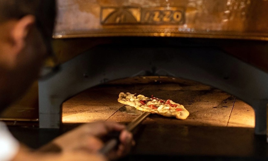 Image 2: Savor Authentic Turkish Pide with a Refreshing Drink