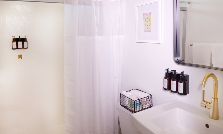 Image 12: Relax by the pool with lake views and mountain breezes