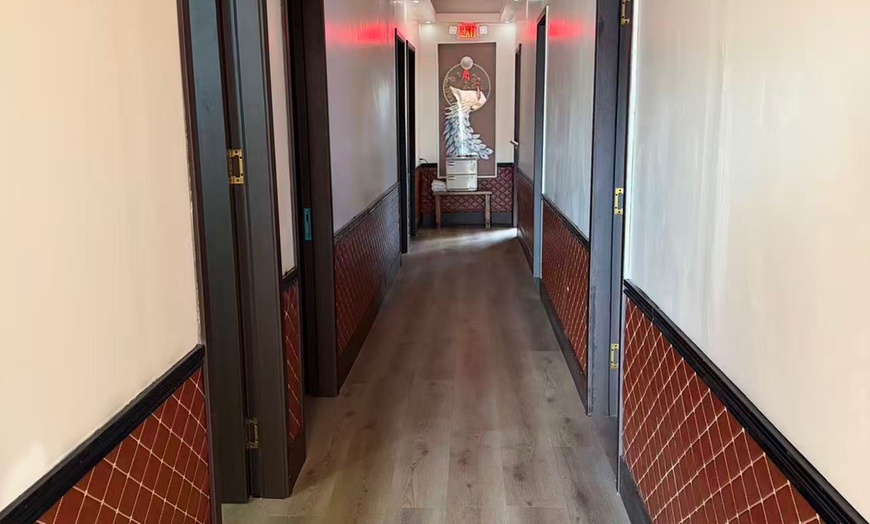 Image 2: Solo or Couple Therapeutic Body Massage + Hot Stones & Essential Oils
