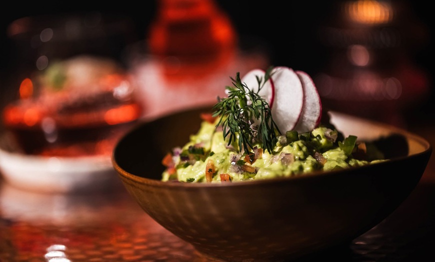 Image 12: Three-Course Dinners or Dining Credits at a NYC Wine Lounge