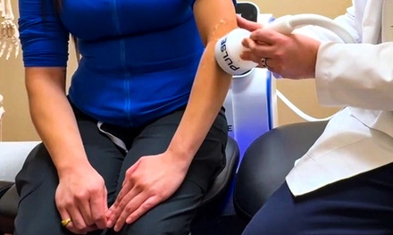 One Focused Shockwave Therapy Session with Consultation and Exam - Enlighten Tan & SPA