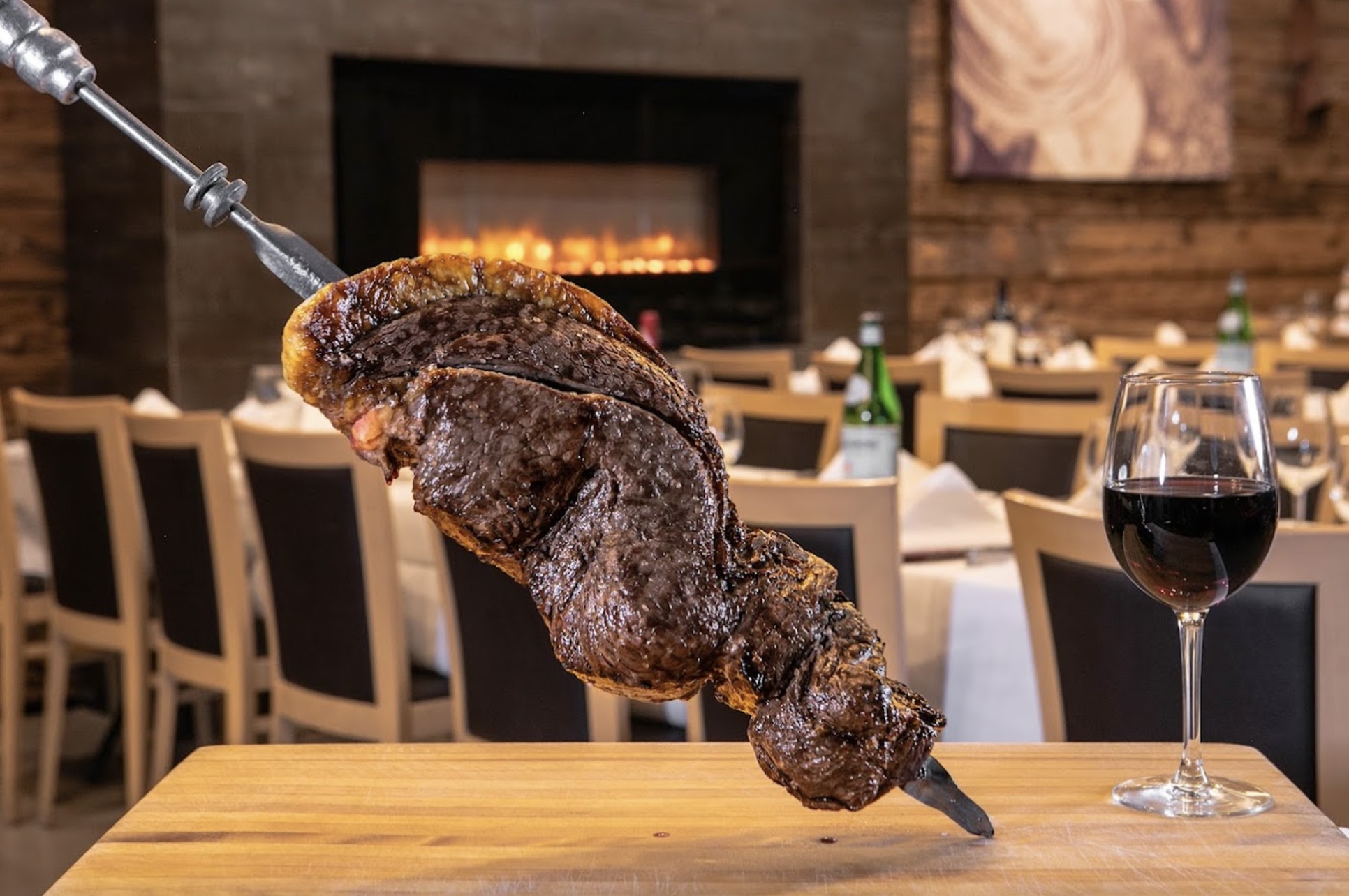 All-You-Can-Eat Brazilian Steakhouse Rodizio for 2 / 4 w/ a Bottle of Wine; Sun-Thurs or Any Day (Up to 25% Off)