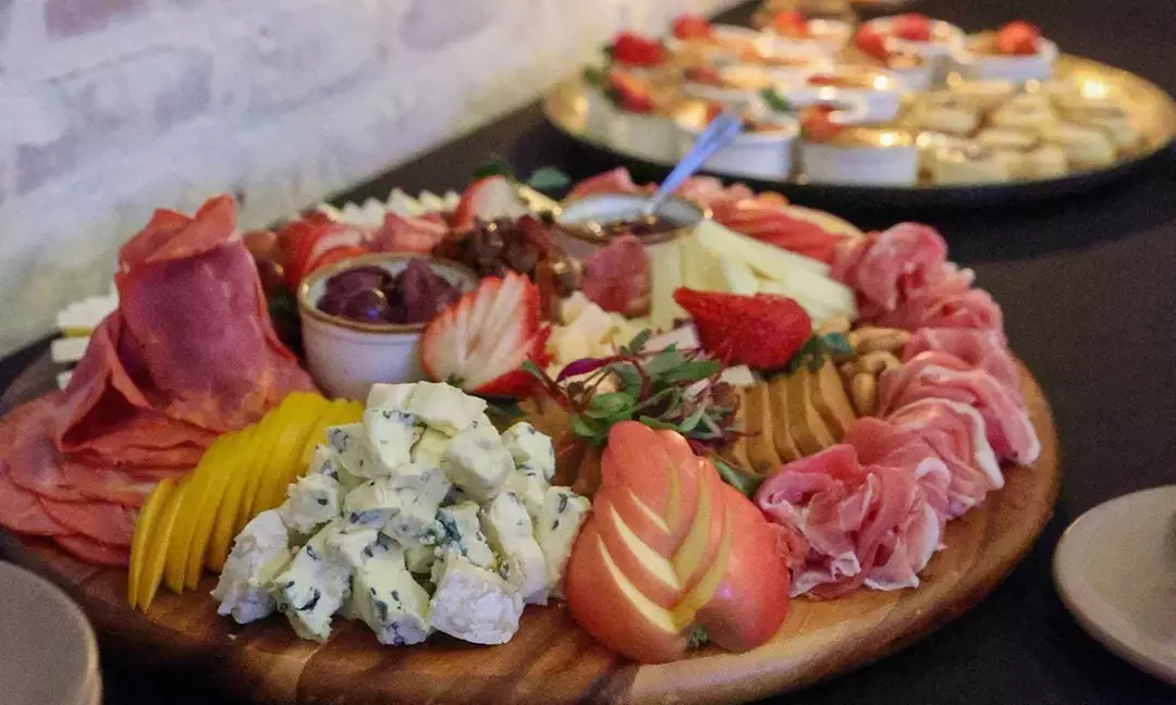 $25 or $55 Towards Food and Drink or Two Entrees and a Bottle of Wine