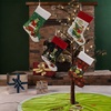 Image 4: Four Pack Grinch-Inspired Christmas Stockings