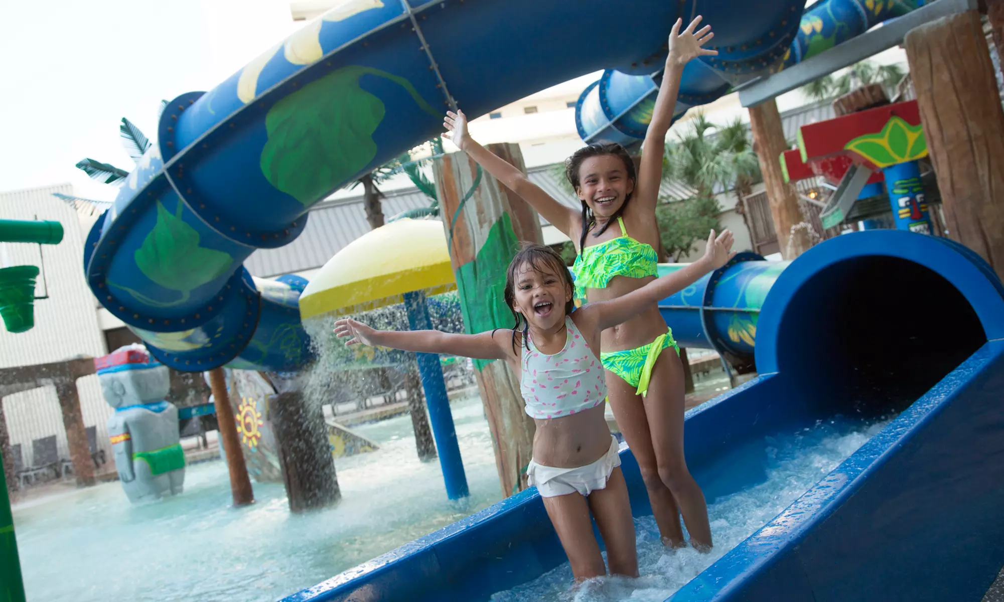 Family fun awaits at Ocean Reef Resort—pools, slides & ocean views!