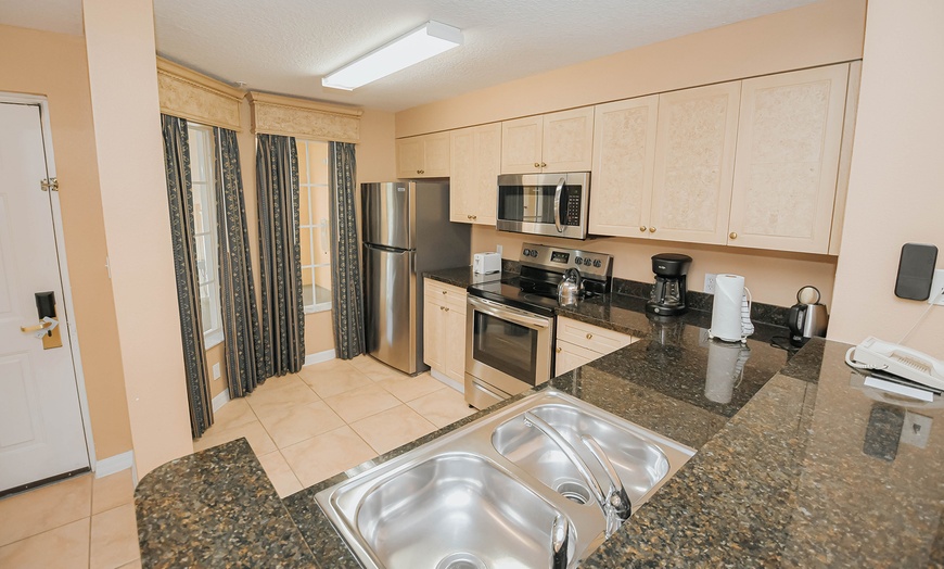 Image 8: Condo Resort With Mediterranean-Style Suites & Pool
