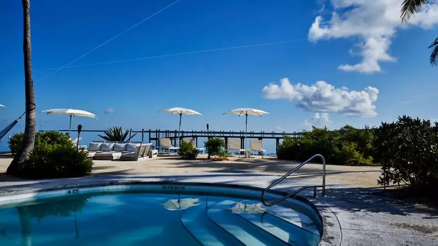 Relax by the water with stunning views and tropical vibes